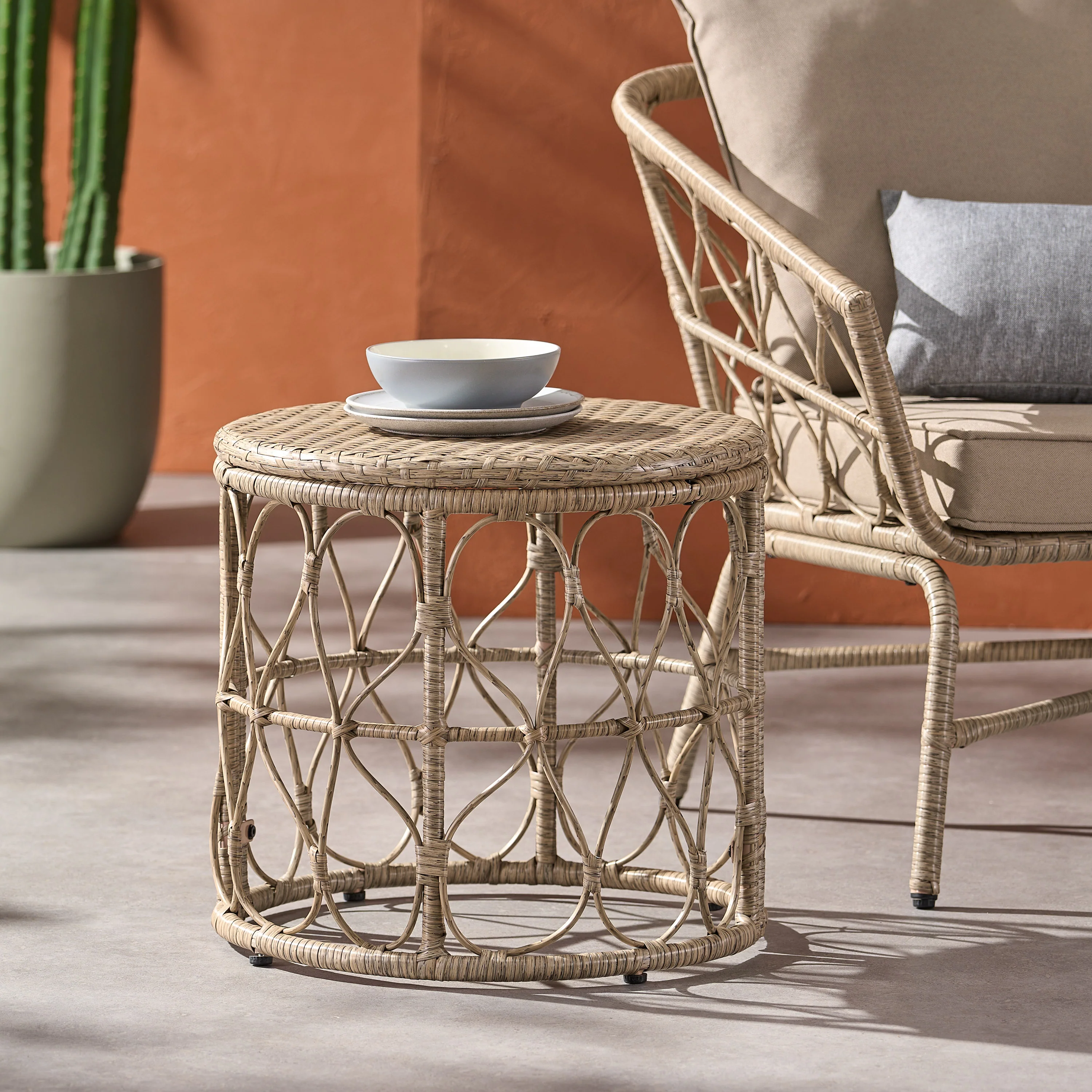 Cultured Outdoor Side Table with Wicker Weave Top and Looped Design - Image 2
